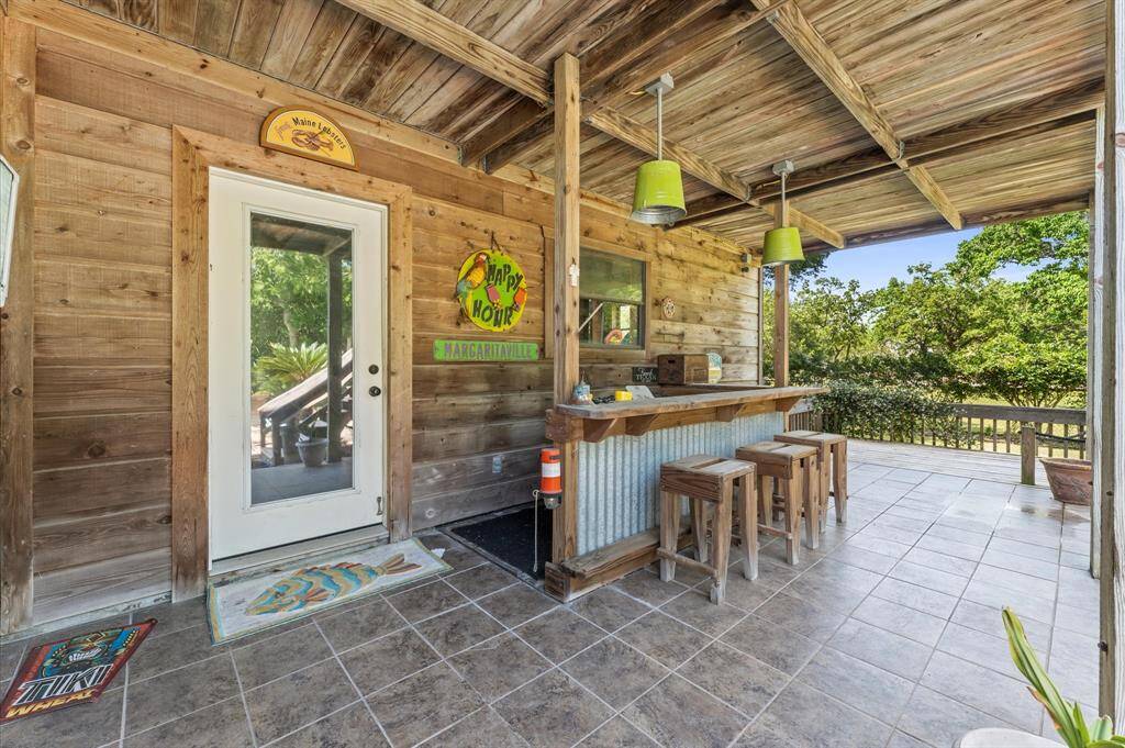 Entertain with your outdoor bar area right off of the pool