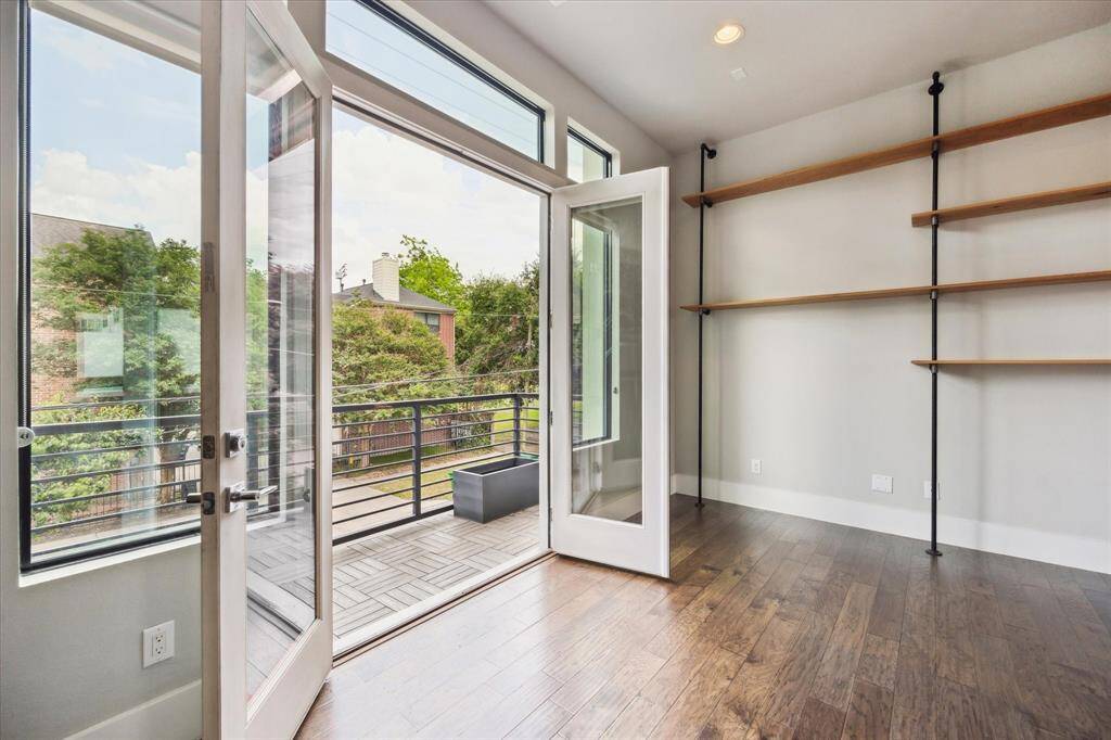 You will love the floor to ceiling custom oak shelving in the dining area, with space left for a desk or buffet on the left. Enjoy the luxury of that indoor-outdoor feeling with beautiful french doors leading to your large balcony. A hosts dream!