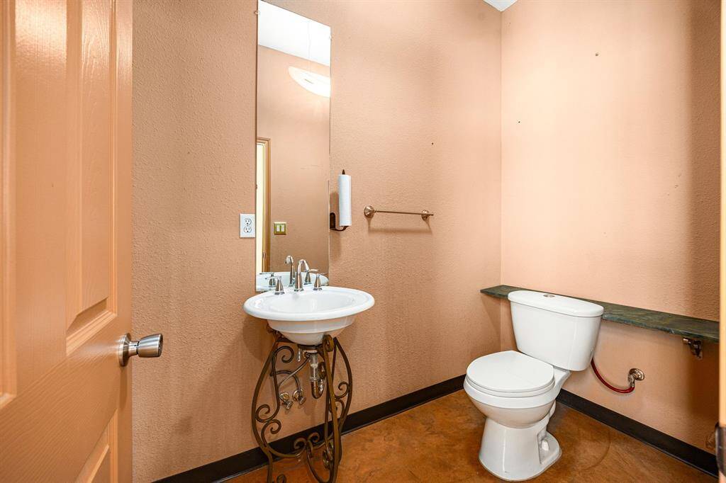 There is a bathroom in the downstairs garage apartment/office area for added convenience.