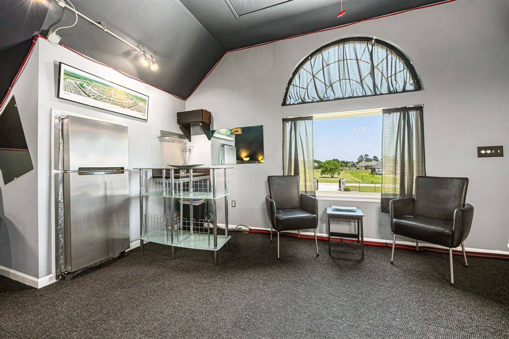 Head upstairs to the second floor of the garage, where you'll find an incredible entertainment space that’s bound to wow you!