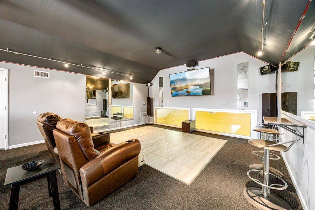 The upstairs hangout space boasts a dance floor, strobe lights, and a disco ball—making it the perfect spot for a party!