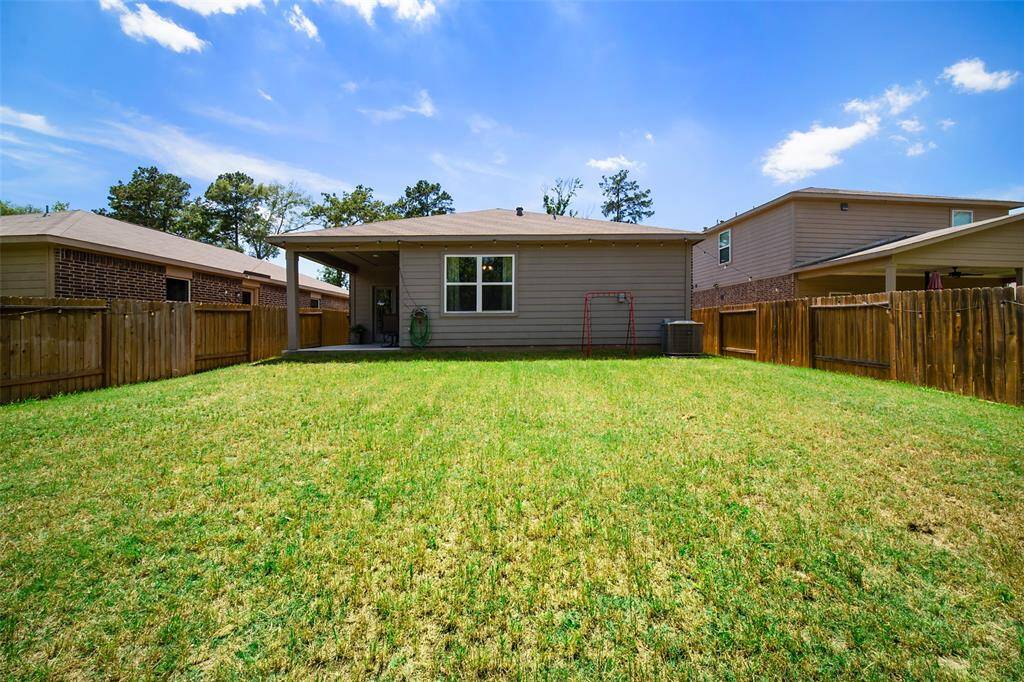 This angle showing the back of the home also shows more of the backyard's potential.