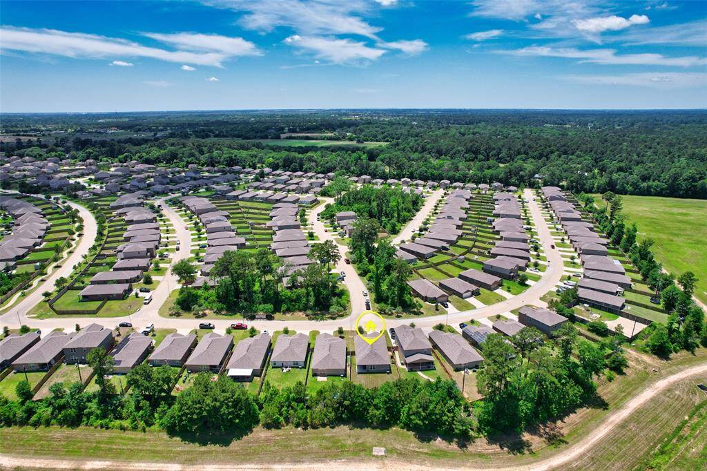 The trees on the back perimeter of these houses add to the desirability of the home's location.