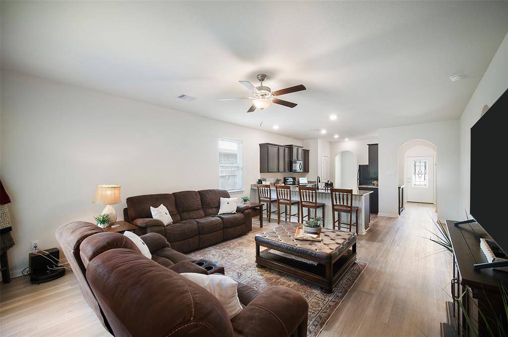 The sweeping view toward the front of the home shows how open and inviting this well-designed floor plan is.