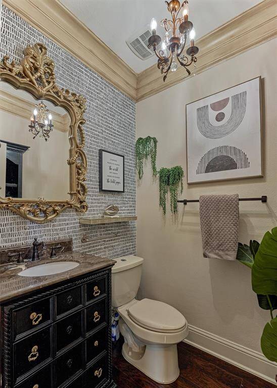 Half bathroom with stunning framed mirror