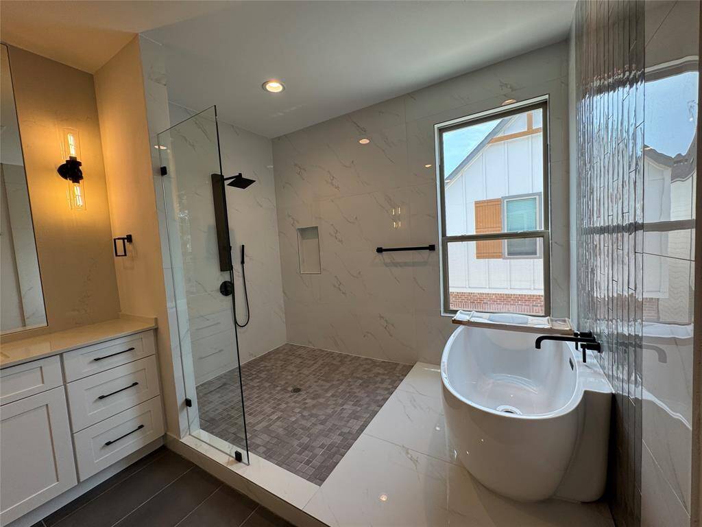 Oversized wet area with separate shower and tub