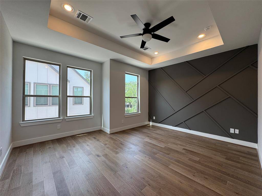 Primary bedroom with plenty of natural light