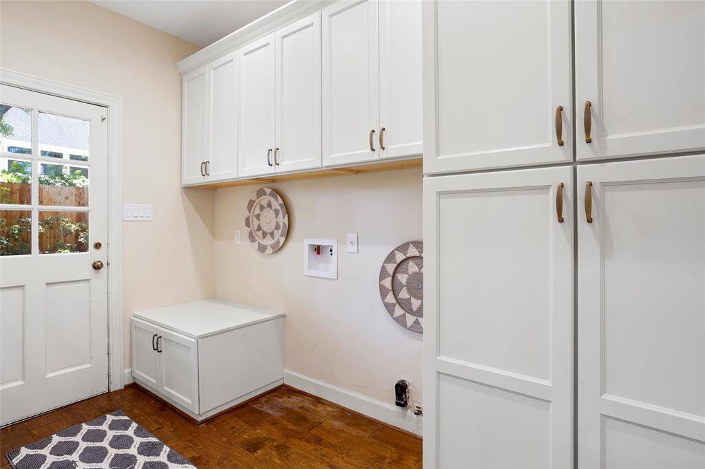 Utility room is not far away with easy access to the back exterior and garage.