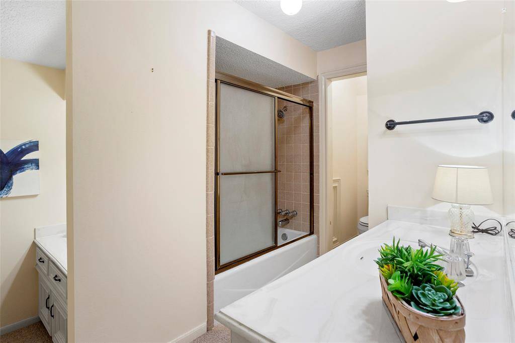 Sharable tub/shower combo...and shares access directly to the game room.