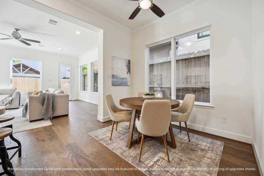 Your dining area is perfectly tucked away—intimate enough for dinner for two, open enough to feel part of the flow. Large windows let the sunshine pour in.