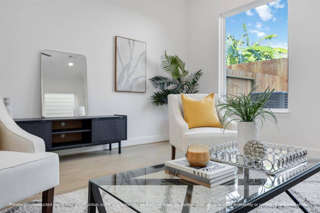 This cozy corner is all about the details—designer trim, crown molding, and gorgeous wood-look flooring set the scene for stylish, everyday living.