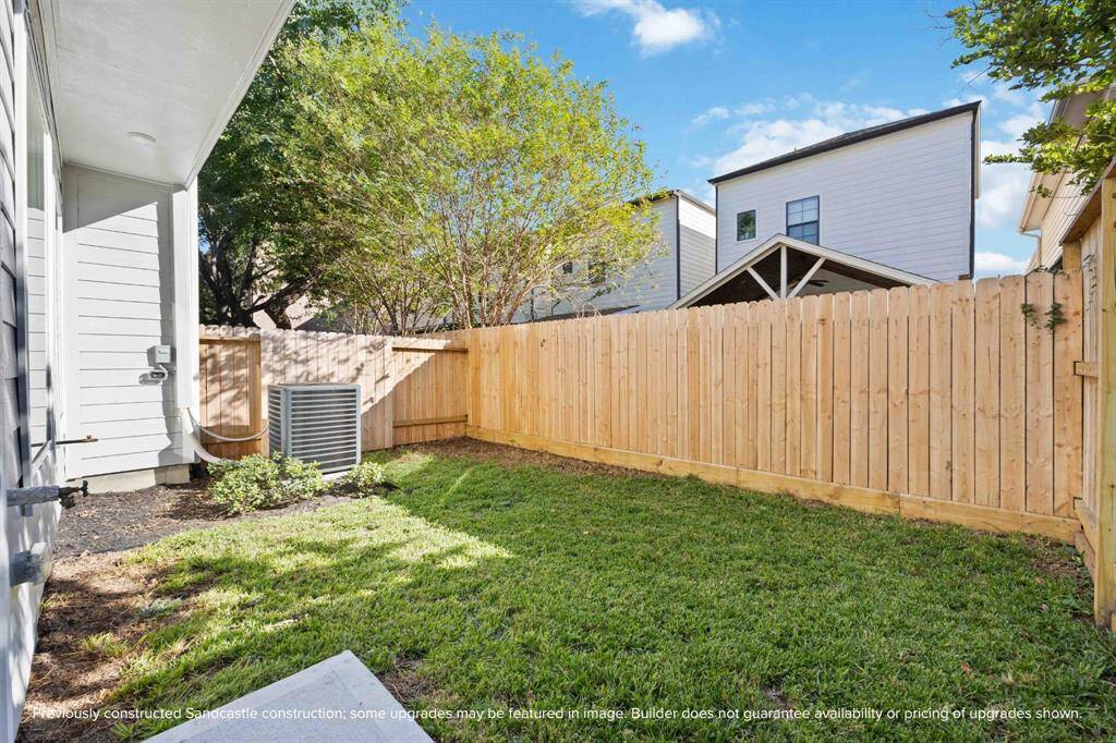 A right-sized green space—perfect for pets, grilling, or just soaking up some sun. This low-maintenance yard gives you space without the hassle.
