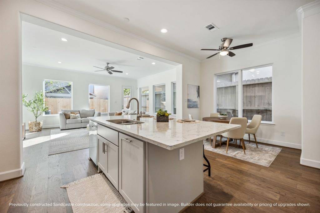 Whether you’re prepping dinner or pouring wine for friends, this oversized island is the hub of the home—anchoring the kitchen, dining, and living areas with ease and elegance.