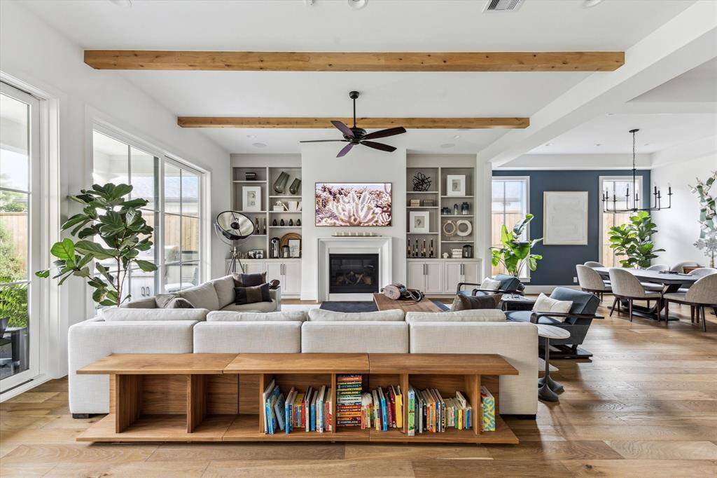 Gourmet Kitchen Island Features Lots Of Hidden Storage. Paneled Thermador Refrigerator & A Lovely Dining Area Complete With Built-In China Cabinet and Natural Light.
