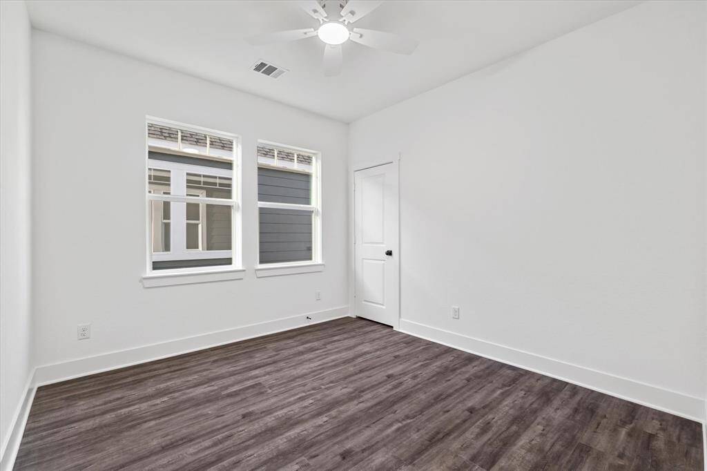 Bedroom two with walk-in closet & ceiling fan!