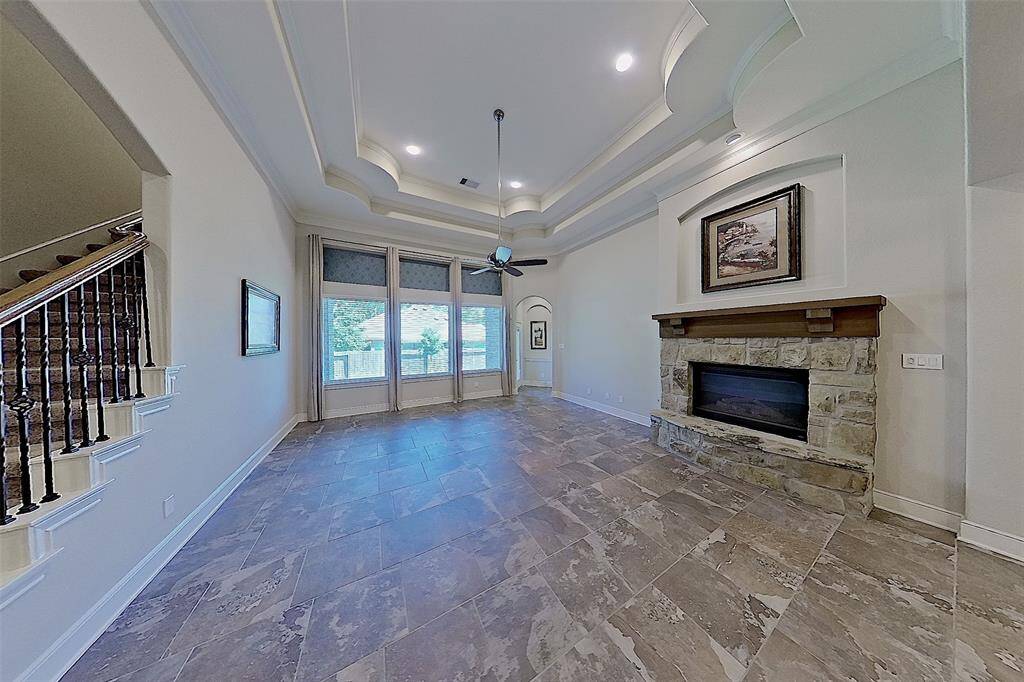 Plenty of space in the Family room with stone fireplace