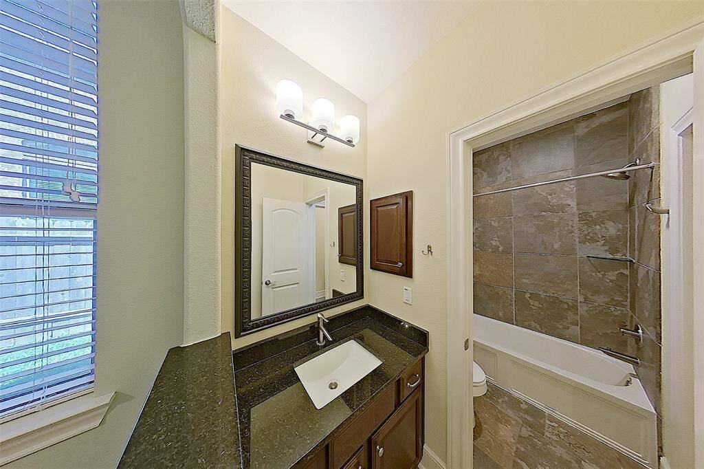 View of 3rd and 4th bedrooms bath