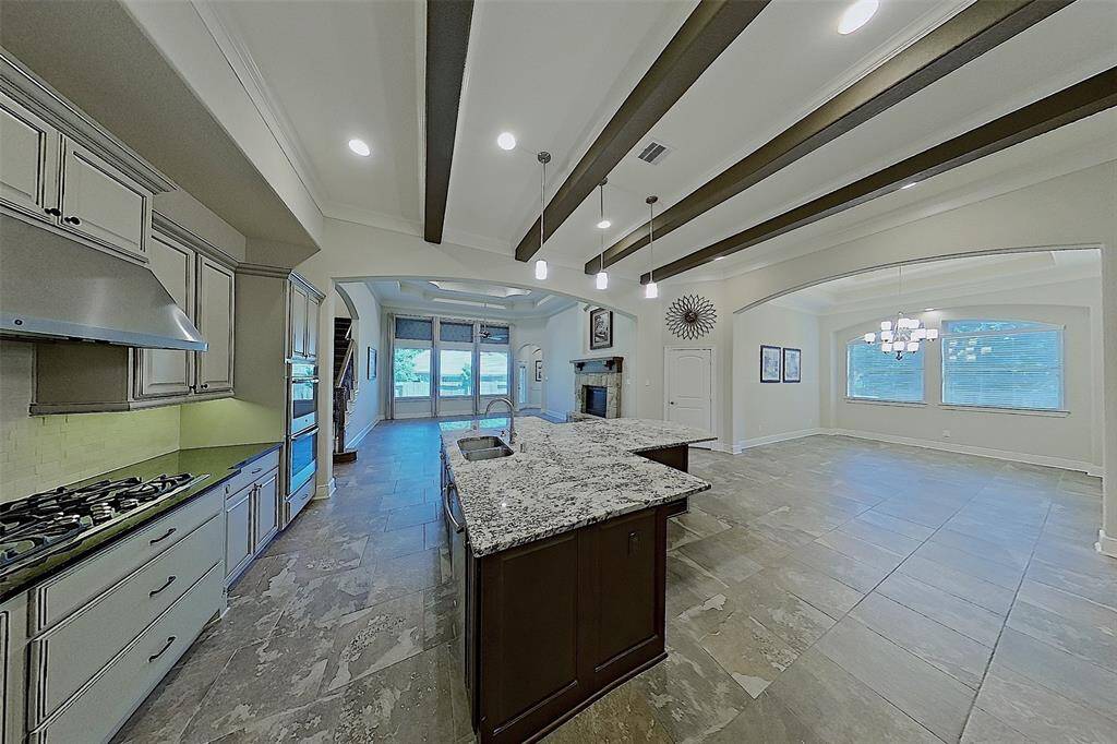 Kitchen opens to large DR and Family room