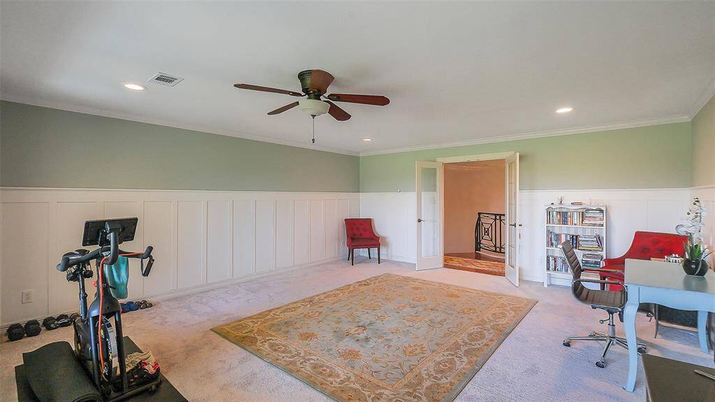 Wow.... this game room upstairs if HUGE.   Recent carpeting upstairs. Wall of windows looking out to the balcony and golf course views.