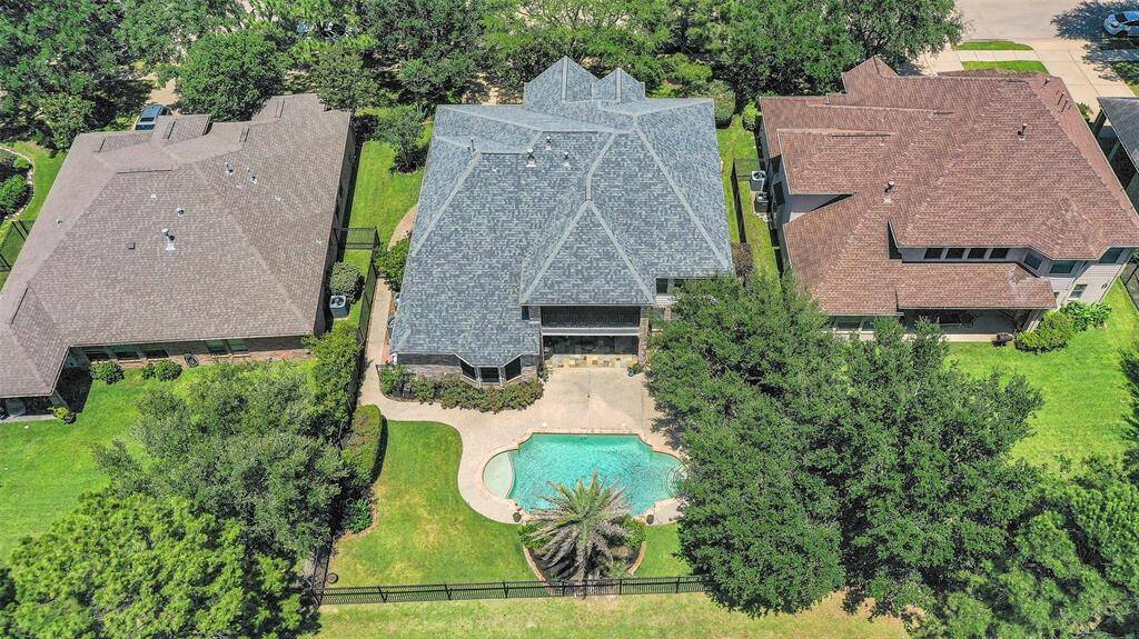 Aireal view of your new home. Large lot with plenty of grass space for pets, children and gardening.
