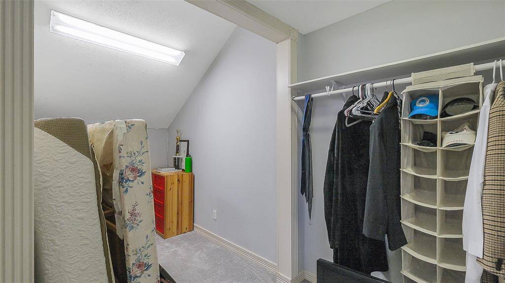 Guest bedroom #2 sits on the opposite side of the game room.  Fresh paint, flooring and ceiling fan.