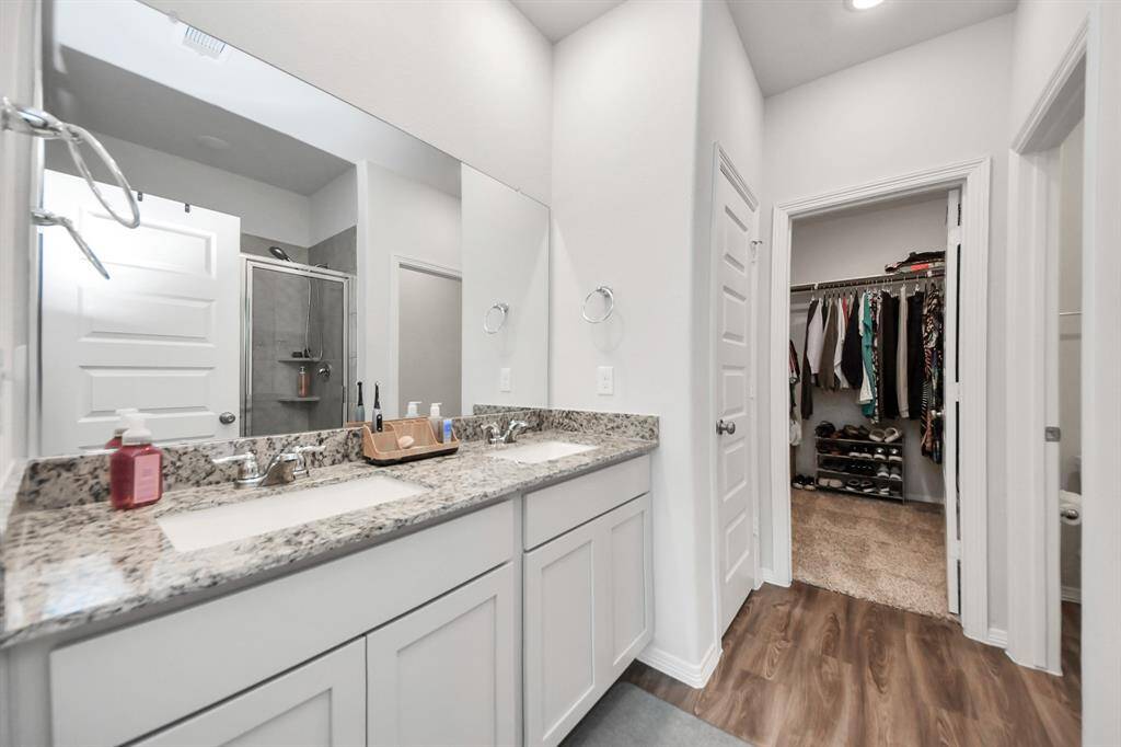 Primary Bathroom with double vanities