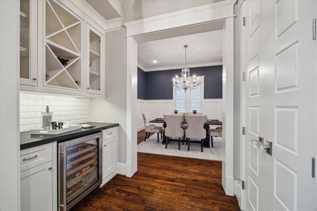 Dry bar with wine fridge and a LARGE walk in pantry.