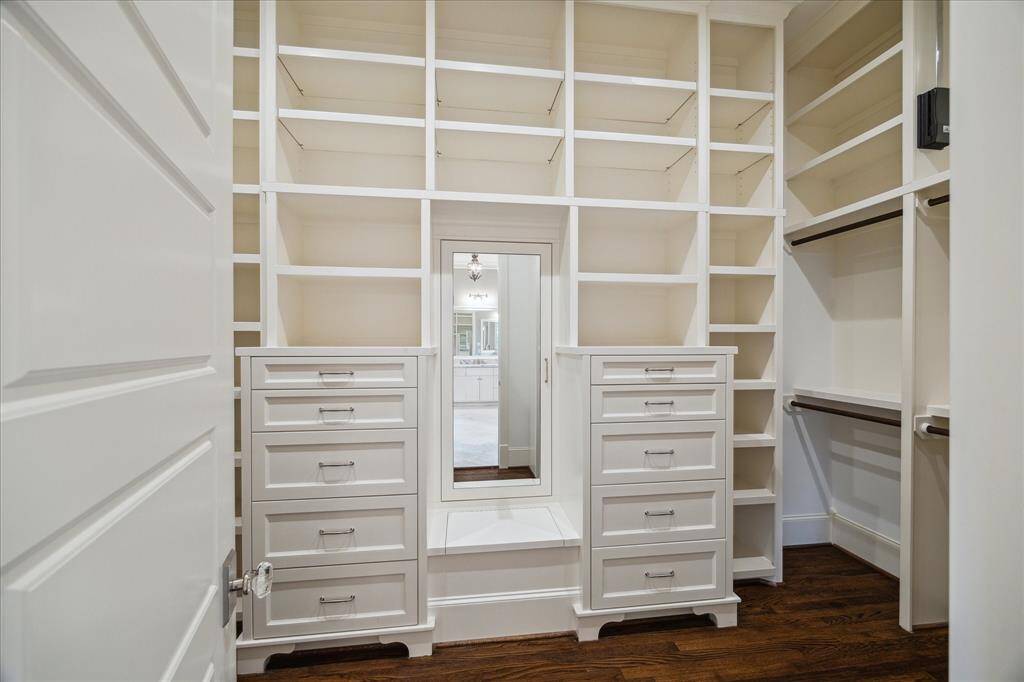 Massive custom closet with storage and built ins!