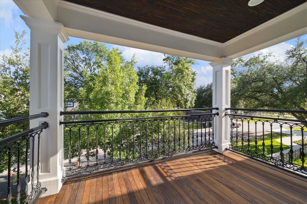 Covered balcony off the second floor.