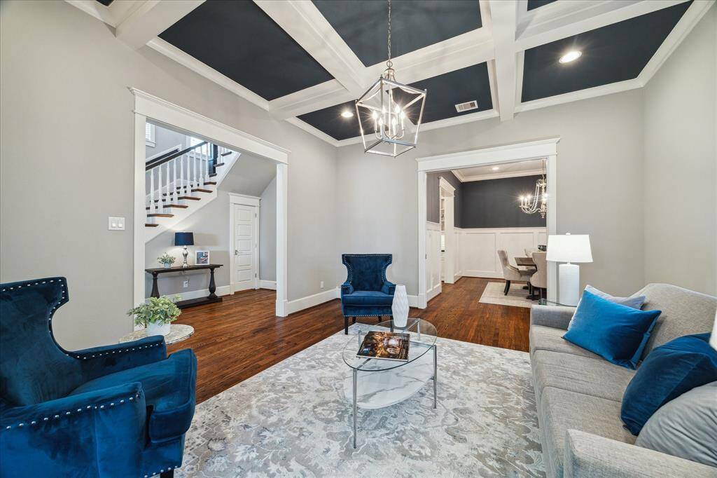Double pocket doors separate the formal living and formal dining.