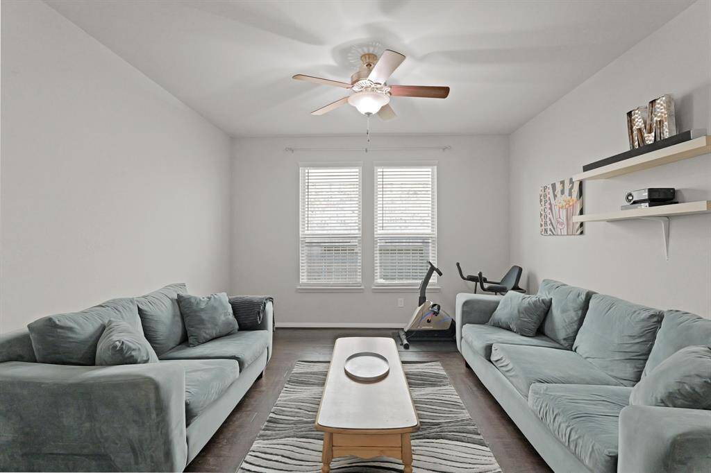 Need a home theater, playroom, or 5th bedroom? This oversized flex room with closet, window, and ceiling fan checks all the boxes.