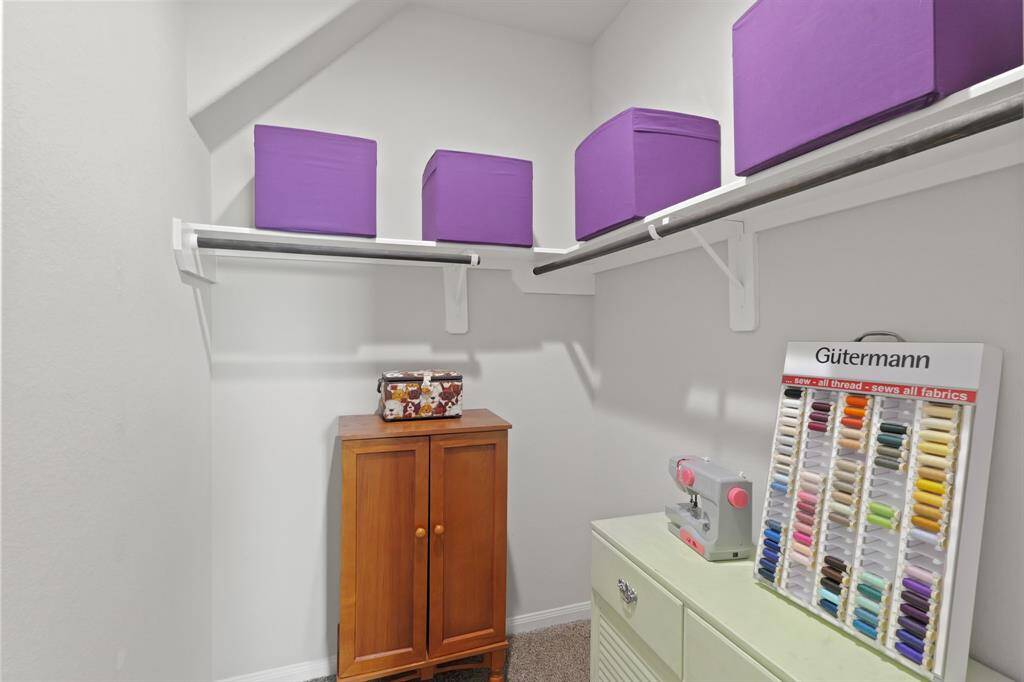 The oversized walk-in closet is a major bonus, offering storage space typically found in primary suites.
