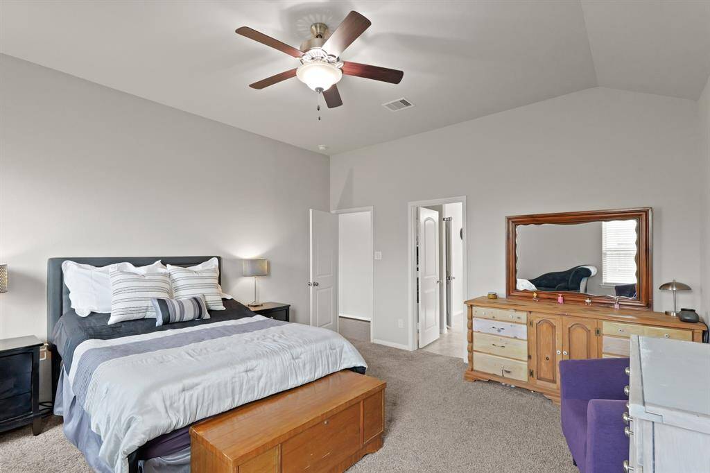 The layout offers easy flow into the ensuite bath and closet, creating a private retreat that functions just as well as it feels.