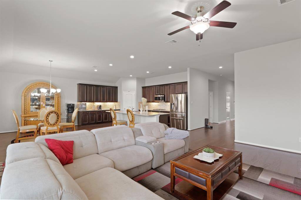 From any angle, this space delivers the oversized island and expansive layout steal the show.