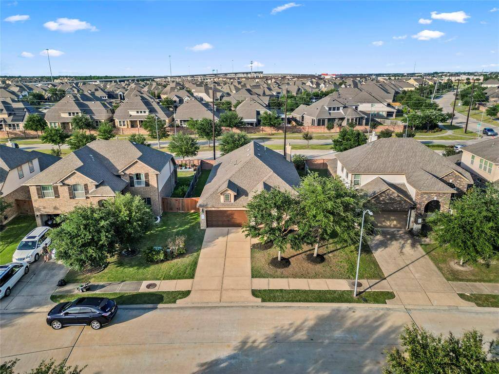 Perfectly placed in a gorgeous community, this charming brick home offers curb appeal and convenience—just minutes from nearby shops, schools, and commuter routes.