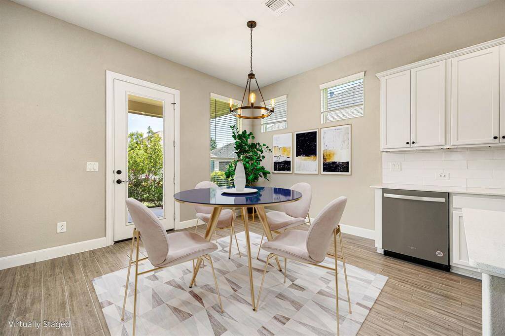 Breakfast nook virtually staged. Have your morning coffee or a casual meal.