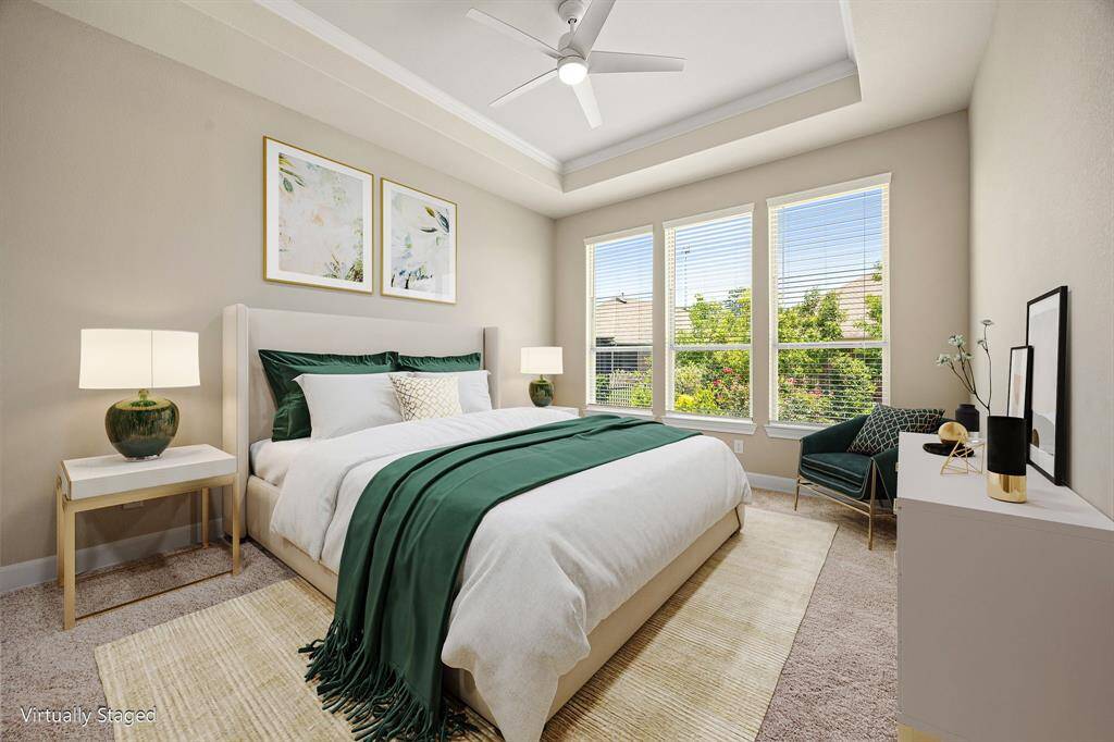 Primary retreat has high ceilings and a tray ceiling for a very inviting and relaxing atmosphere.