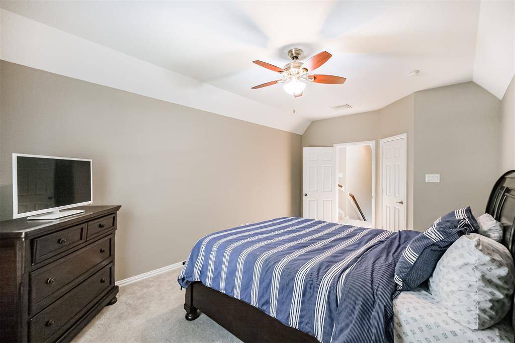 The secondary bedroom sits conveniently next it's own private bathroom.