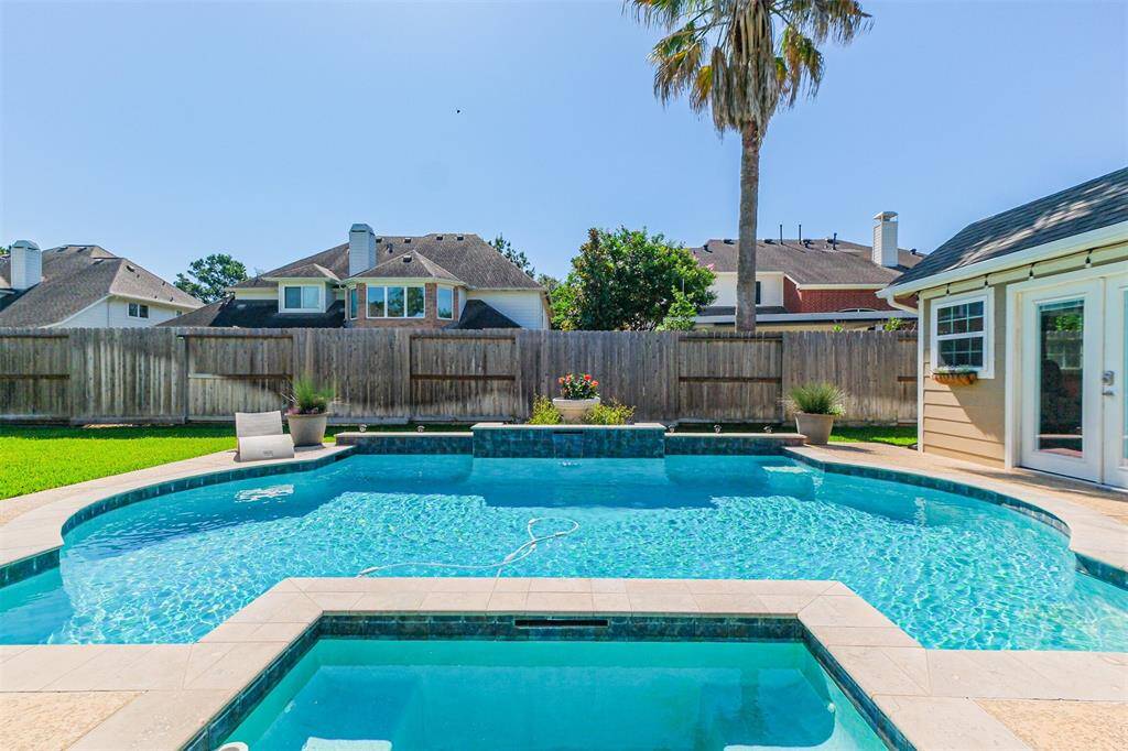 Dive into refreshing pool days or unwind in the soothing hot tub.