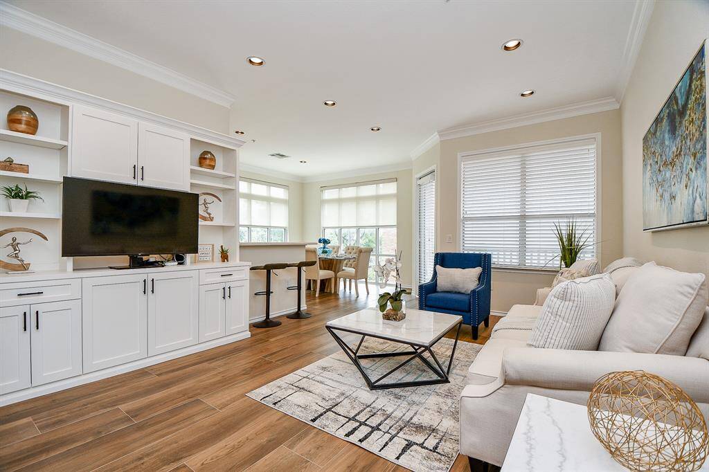 Welcome to 2400 McCue, #210. Corner unit with lots of windows and natural light.