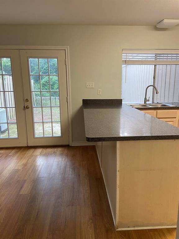 View coming in from the living room to the kitchen/dining area.