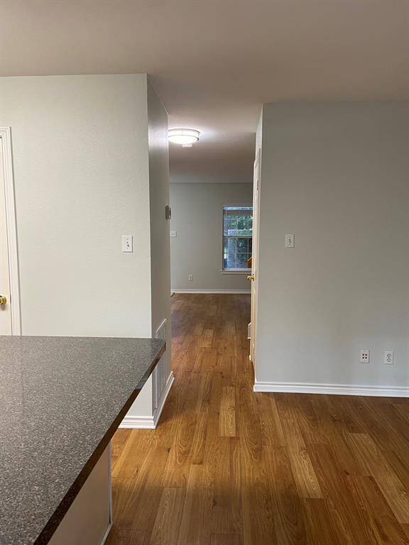 View from the kitchen/dining to the living room.