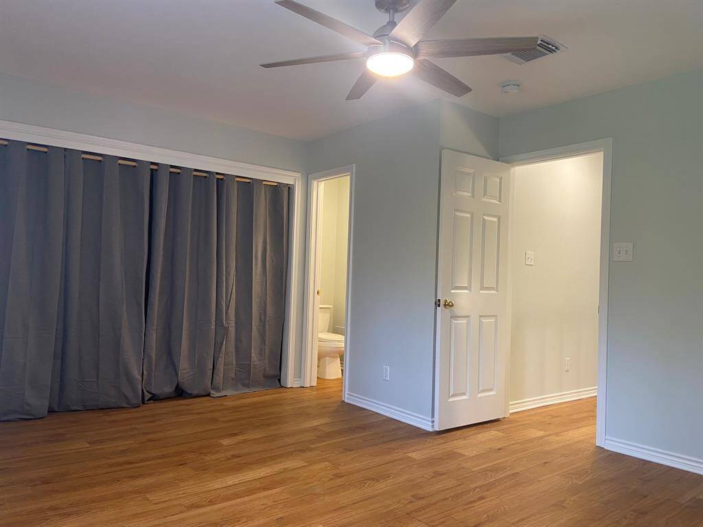 The door on the right is the hall door, the one on the left leads to the bathroom.