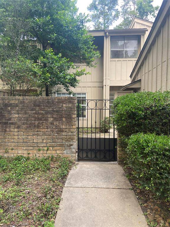 Open the gate to a charming courtyard.