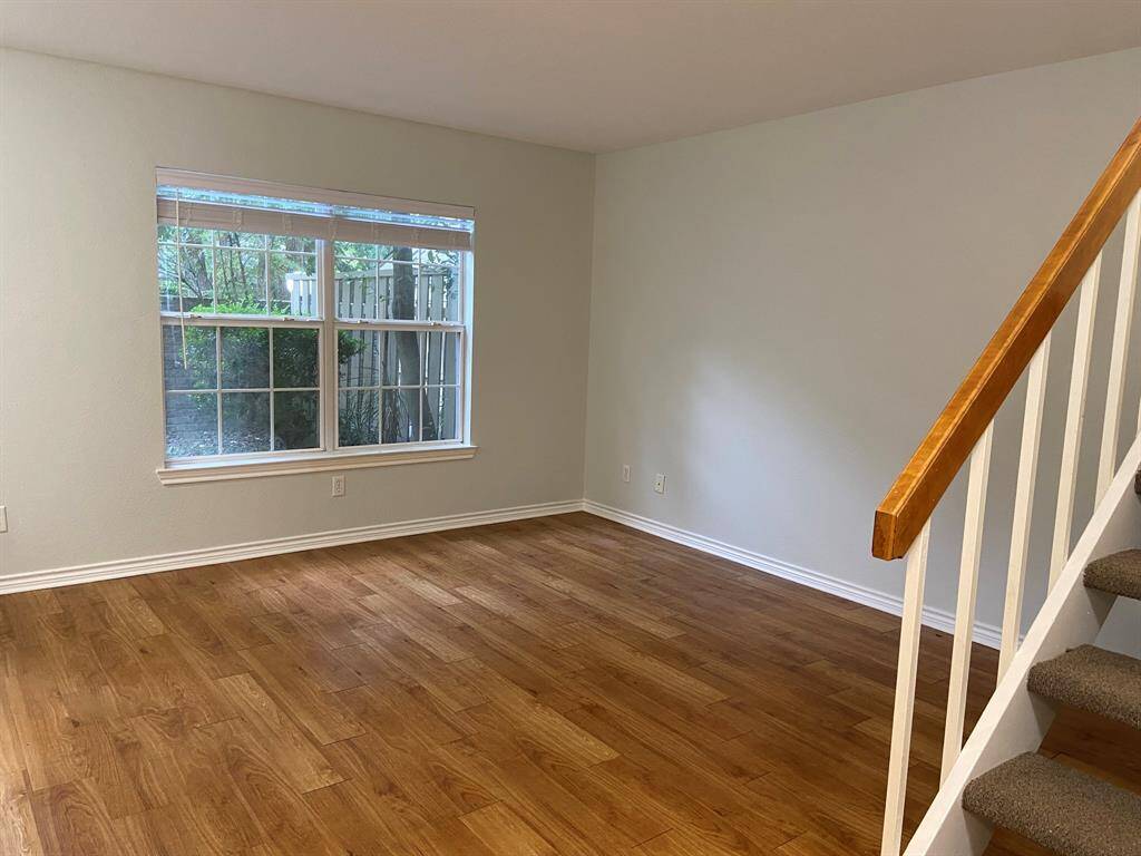 The living room, as seen from the bottom of the stairs.