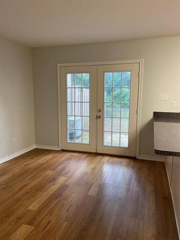 The French doors make the dining area open and bright!