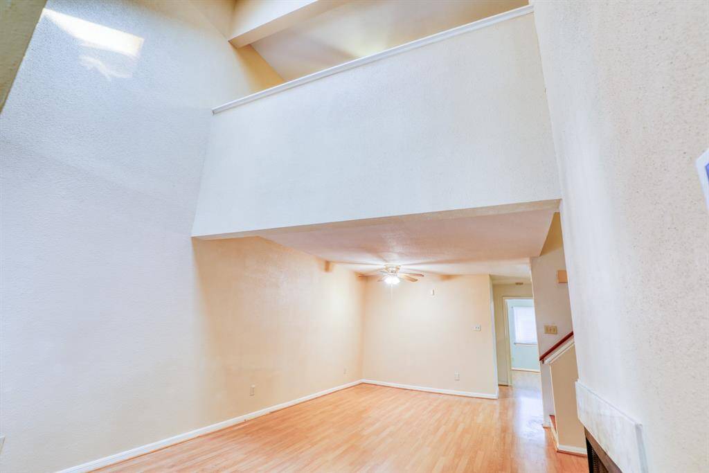 High ceilings at the front door create an open, airy feeling.