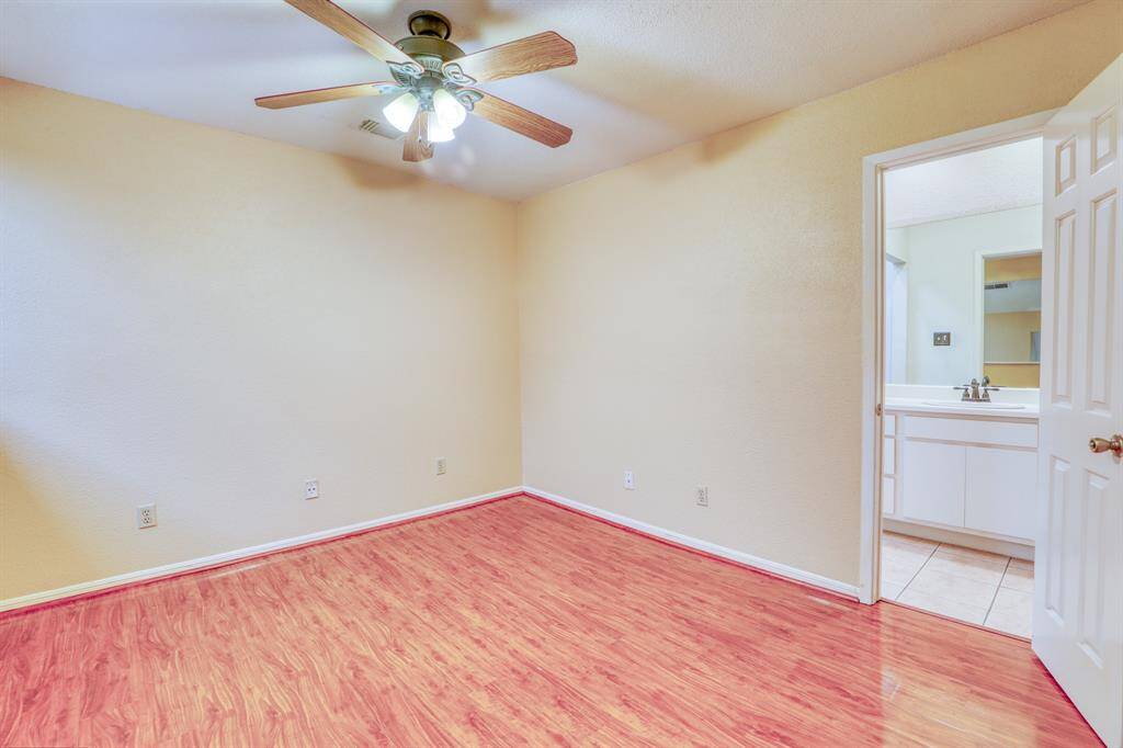 Upstairs is the primary bedroom with private attached bath.