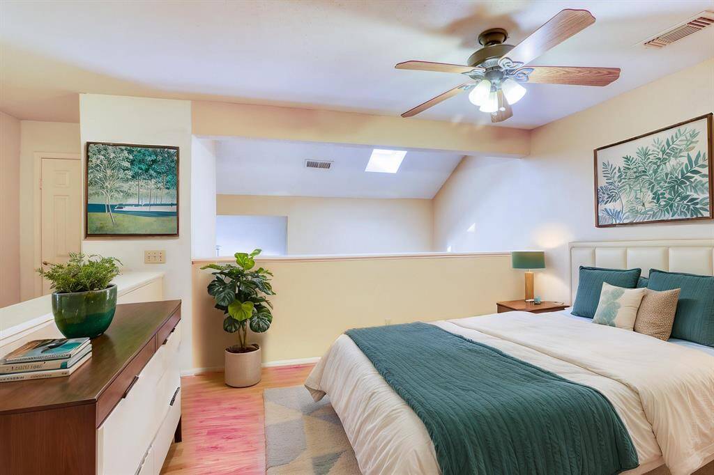 Primary bedroom shown here virtually staged.