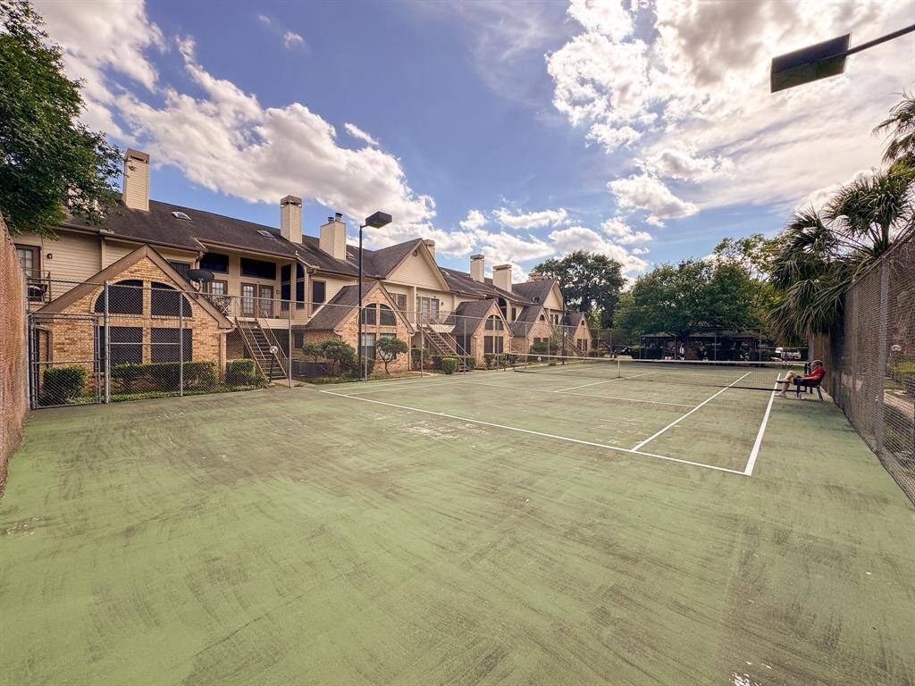 Community tennis court perfect for a game with friends.